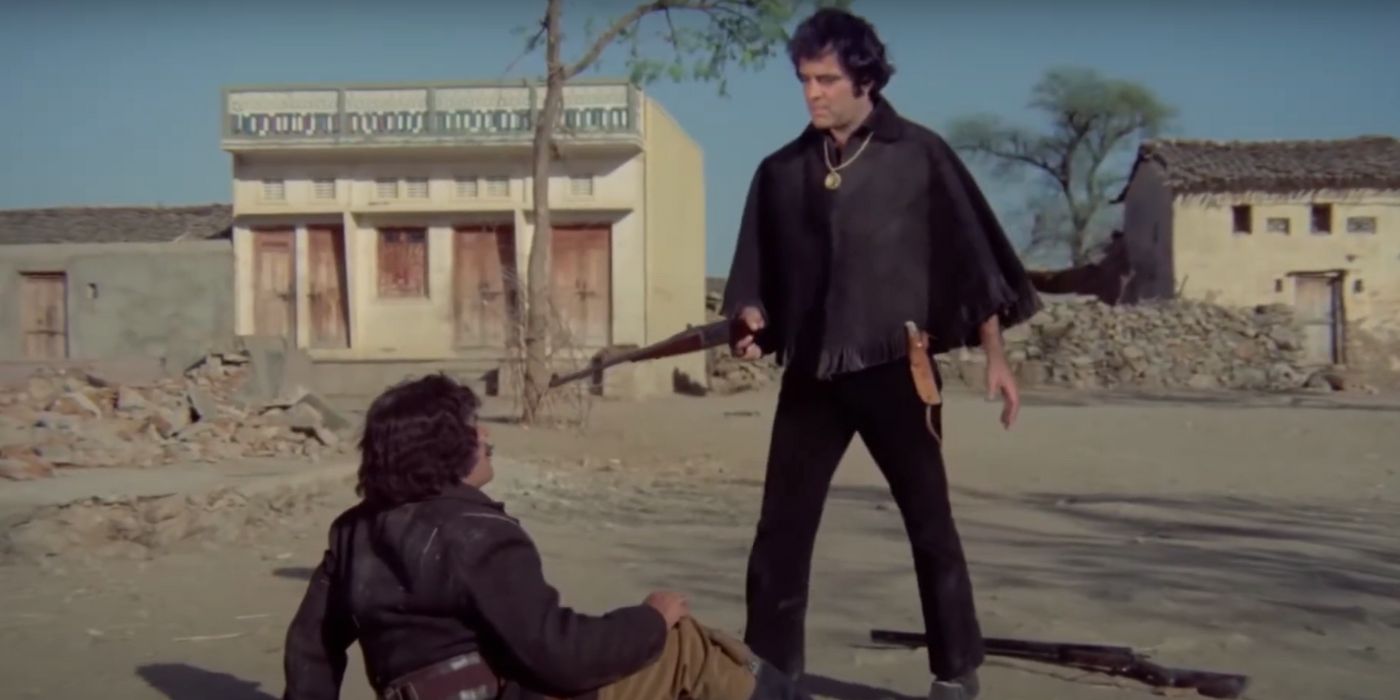 Feroz Khan holding a gun